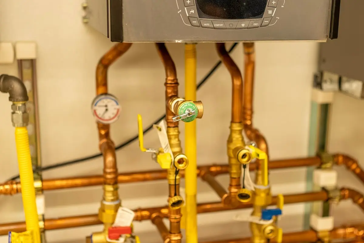 Licensed technician providing Backflow Prevention for a homeowner in Greene